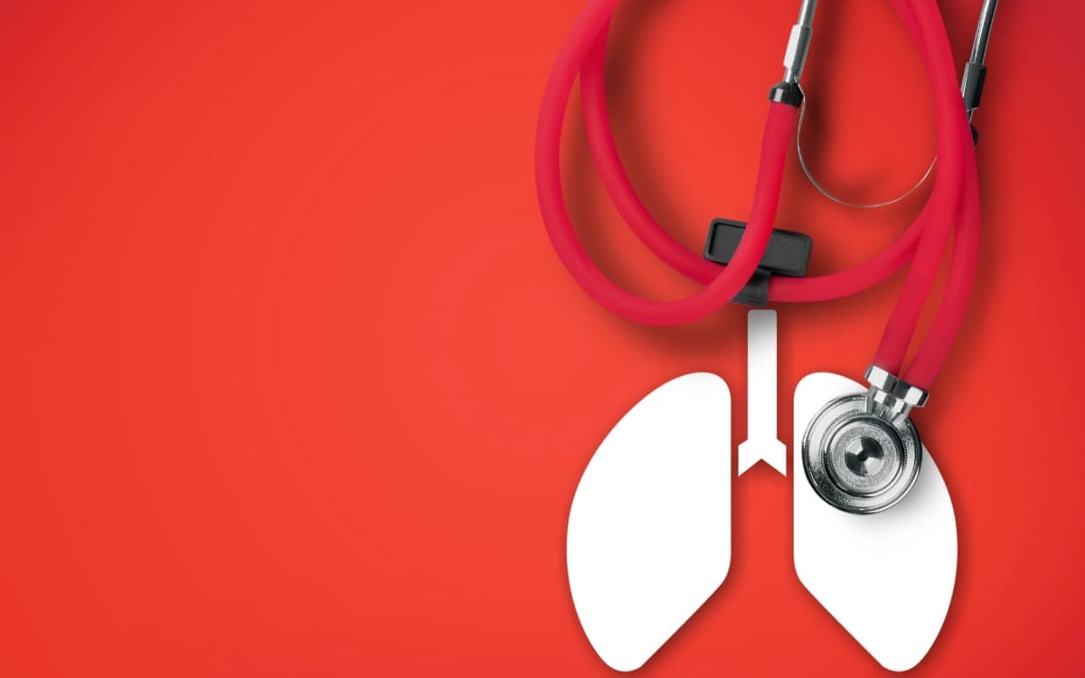 An illustration of white lungs in a red background representing COPD