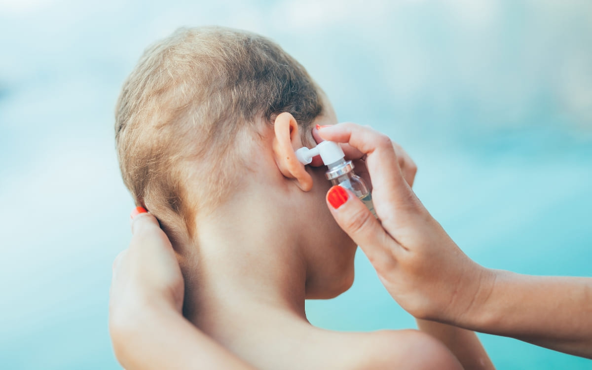 A little boy being treated for an ear infection